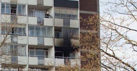 Man dies after jump from burning building