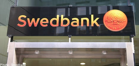 Swedbank bounces back into the black