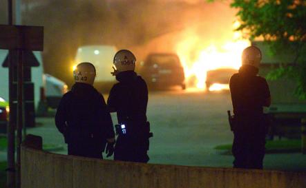 Husby fires<br>On Sunday night, youths torched some 100 cars and smashed windows in Husby, northern StockholmPhoto: Johan Nilsson/Scanpix