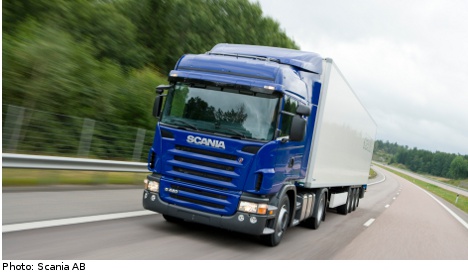 Scania plans production hike as profits fall