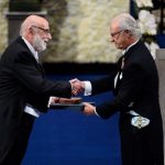  Francois Englert receives his Nobel medal from King of Sweden Carl XVI Gustaf Photo: TT