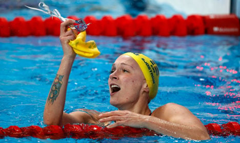 Sweden’s golden girl swims to new record