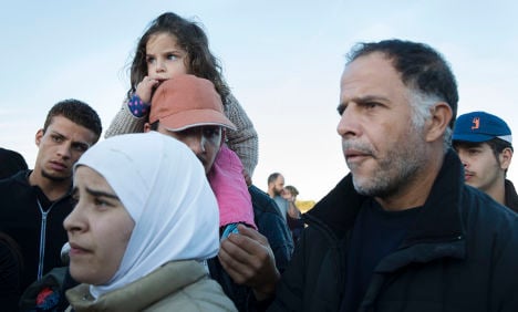 Danes hold refugees set for Sweden in school