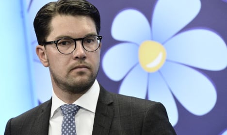 Swedish party named in refugee ads slams drive