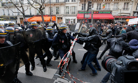 Paris police detain 208 at climate change demo