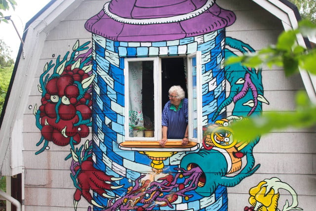 In pictures: Swedish pensioner has giant dragon painted on her house for her birthday