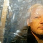 Assange illness postpones US extradition hearing until June