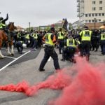 Neo-Nazi march attacked by counter-demonstrators in Sweden